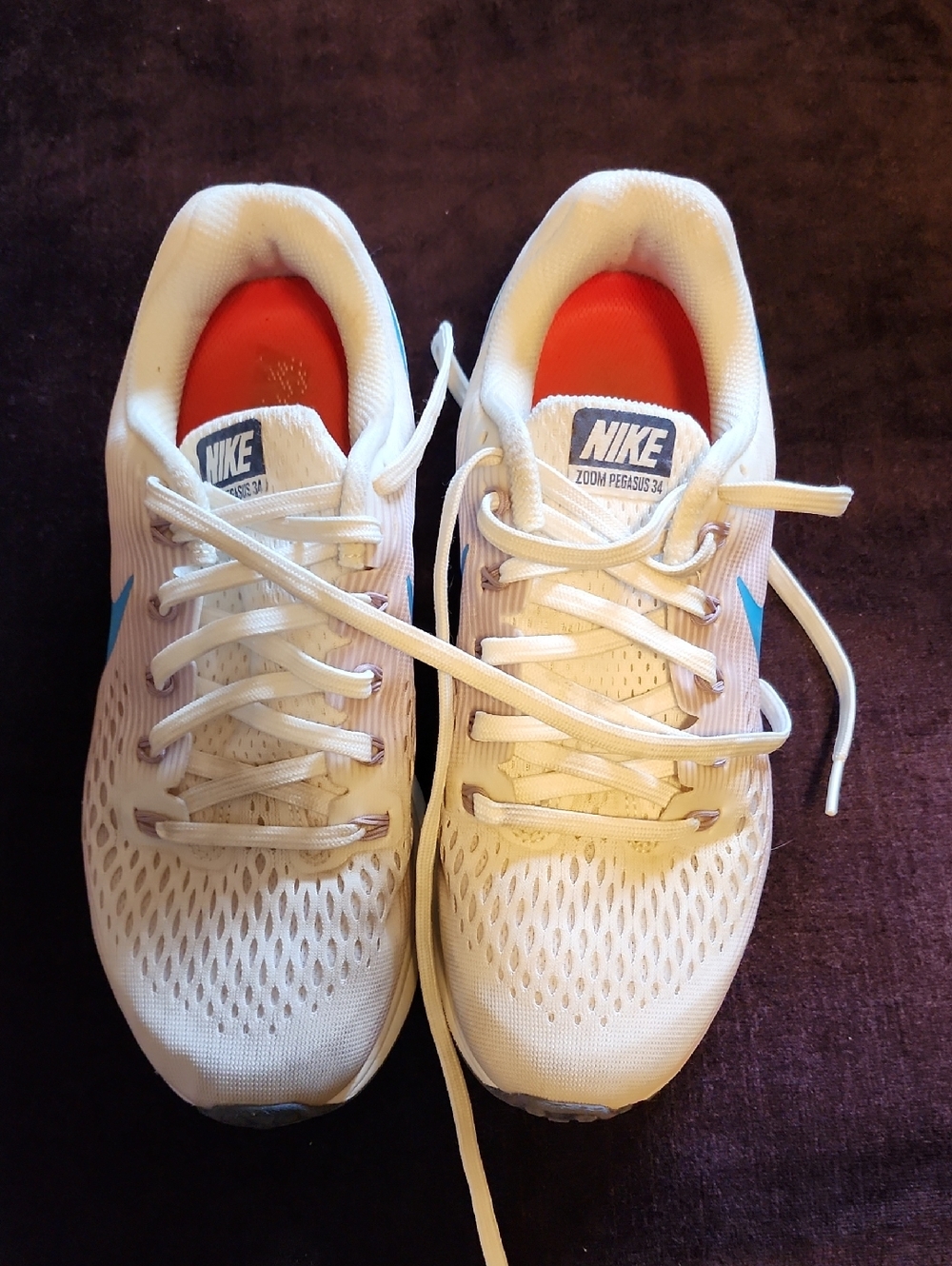 Nike Zoom Pegasus34 Running Shoes with Blue Swoosh and Orange Insole